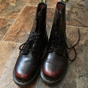 Used- good condition. No flaws. Dr. Martens dark cherry leather boots size 9